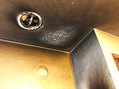 Smoke and fire damage in a room awaiting mitigation near Colorado Springs